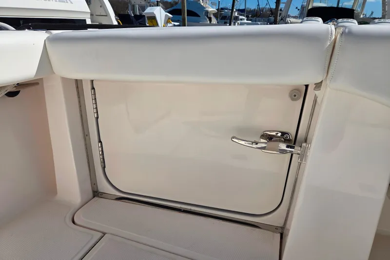 Slide: The Image of Tiara Yachts 3900 Open 2012 boat interior door with chrome handle. - 6