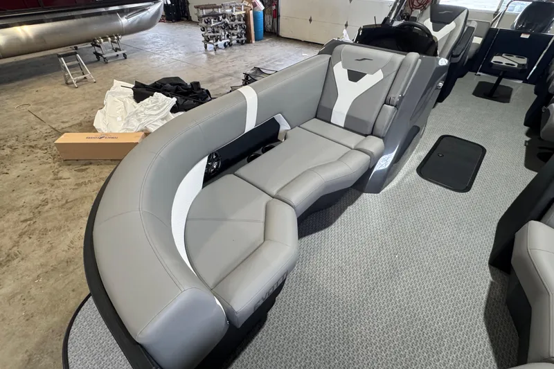 Slide: The Image of Luxurious seating in 2026 Evotti 521QL boat, featuring sleek gray upholstery and modern design. - 2