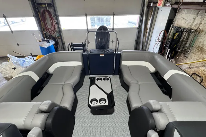 Slide: The Image of Luxurious interior of 2026 Evotti 521QL boat with gray seating and central console. - 7