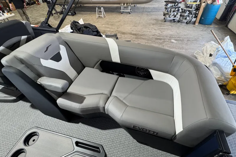 Slide: The Image of Gray and white seating in a 2026 Evotti 521QL boat interior. - 8