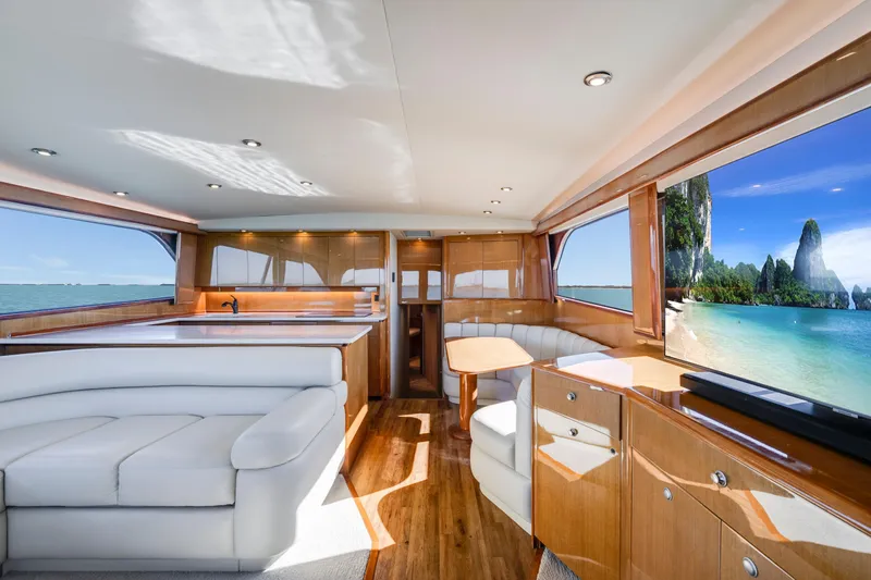 Slide: The Image of Luxurious interior of a 2002 Viking Convertible yacht with ocean view. - 17