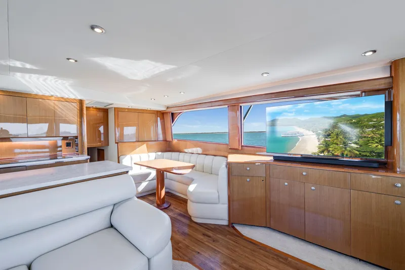 Slide: The Image of Luxurious interior of 2002 Viking Convertible yacht with elegant seating and ocean view. - 19