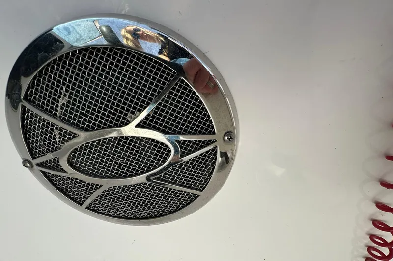 Slide: The Image of Close-up of a speaker grille on a 2016 Hurricane SunDeck 187 OB boat. - 15