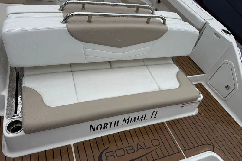 Slide: The Image of 2024 Robalo R317 Dual Console boat seating, North Miami, FL, with teak flooring. - 10
