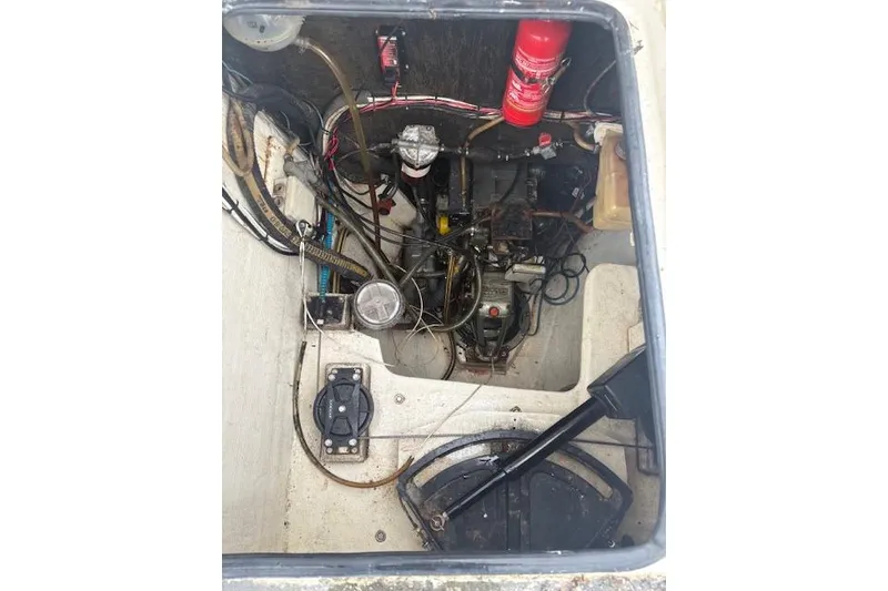 Slide: The Image of Engine compartment of 2004 Soubise Plaisance Freydis 46 catamaran, showing mechanical components and wiring. - 23