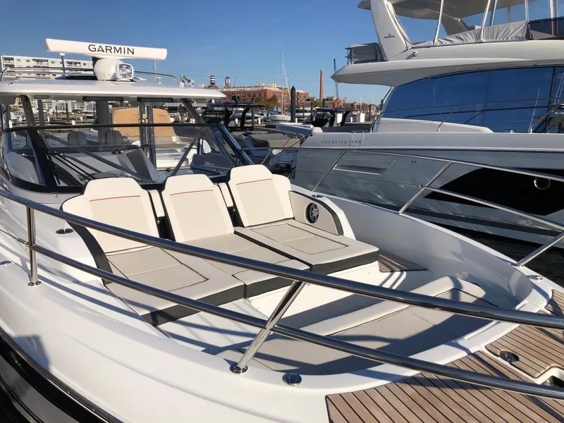 Slide: The Image of 2024 Jeanneau Leader 12.5 WA boat with sleek design and comfortable seating. - 11