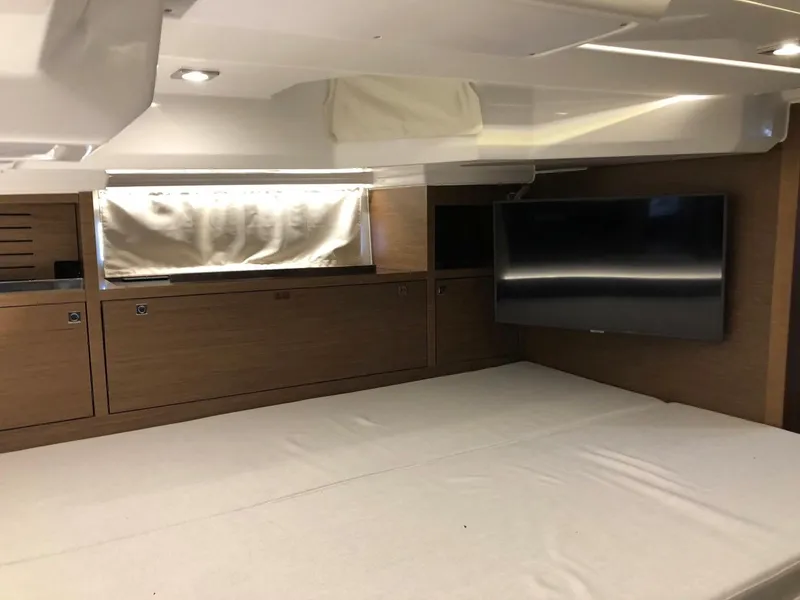 Slide: The Image of Interior cabin of 2024 Jeanneau Leader 12.5 WA with bed and TV. - 31