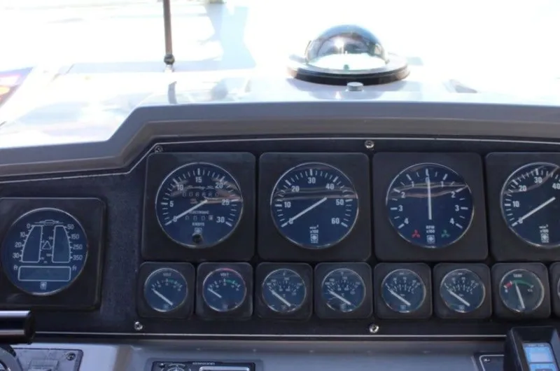 Slide: The Image of Dashboard of a 1988 Formula 35 PC boat with instruments. - 4