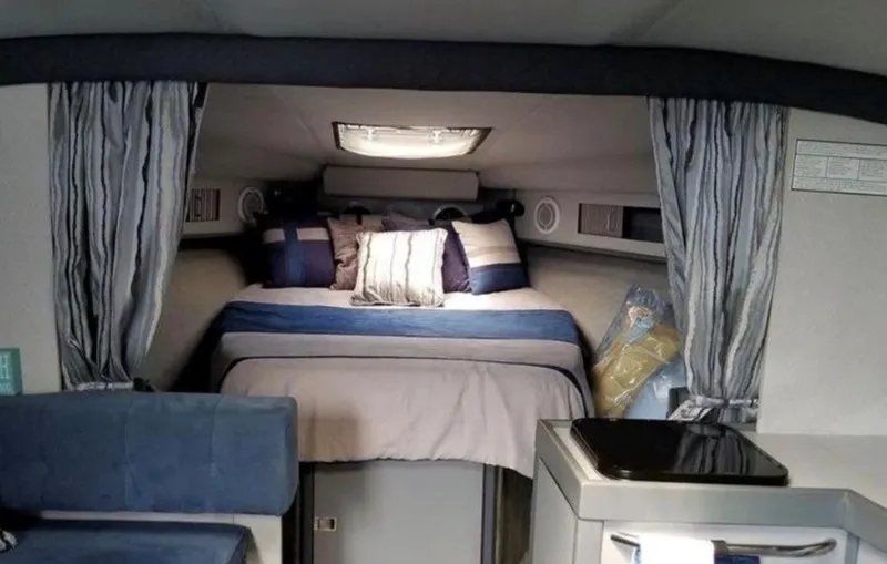 Slide: The Image of Interior of a 1988 Formula 35 PC yacht with cozy bed. - 6