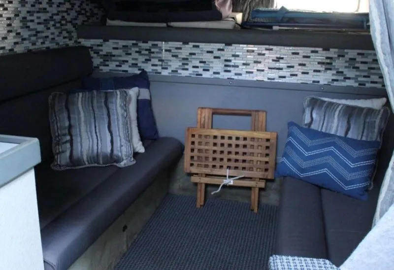 Slide: The Image of Interior of a 1988 Formula 35 PC with cushions and mosaic tiles. - 8