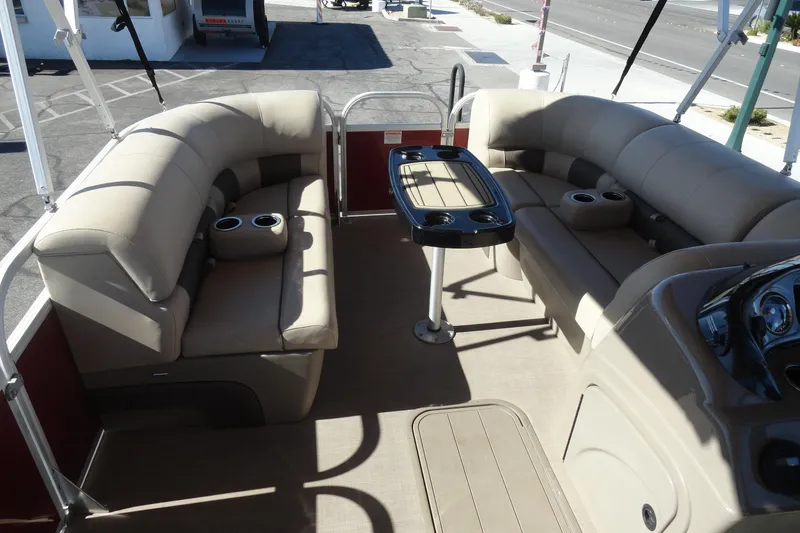 Slide: The Image of 2021 Sun Tracker Party Barge 22 XP3 interior with spacious seating and cup holders. - 17