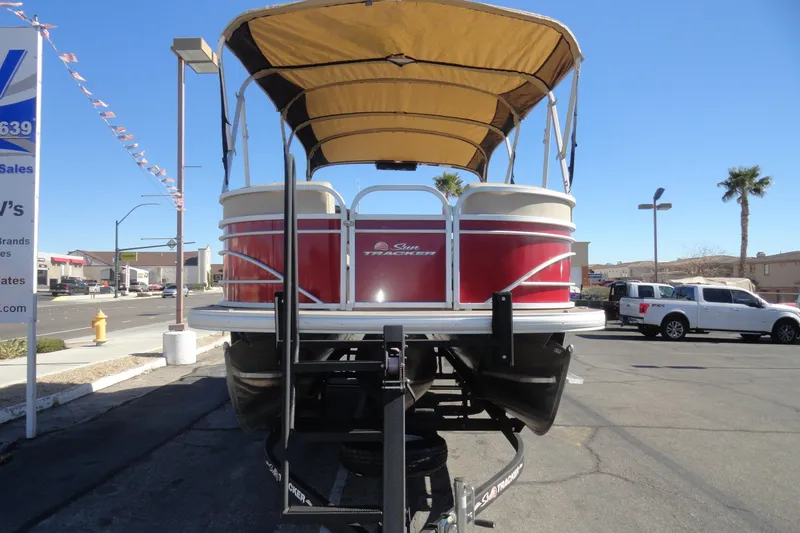 Slide: The Image of 2021 Sun Tracker Party Barge 22 XP3 pontoon boat on trailer, sunny day. - 3