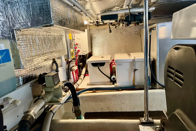 Slide: The Image of Engine room of a 2004 Nordic Tug 42 with equipment and insulation. - 39
