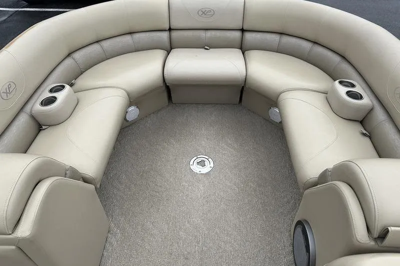 Slide: The Image of Luxurious seating area of 2012 Xcursion X23RF pontoon boat with cup holders. - 11
