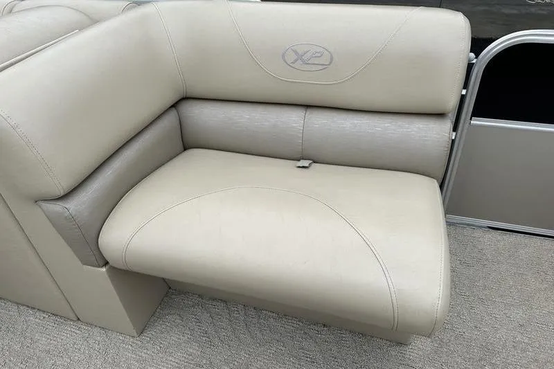 Slide: The Image of Luxurious beige seating on 2012 Xcursion X23RF pontoon boat. - 23