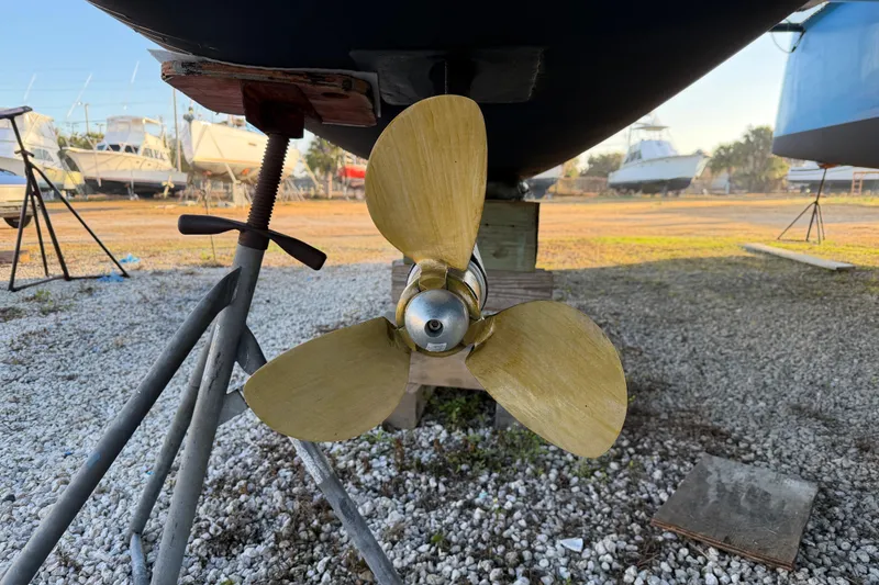 Slide: The Image of Propeller of 2025 C-Catamarans 48 on dry dock, surrounded by other boats. - 101