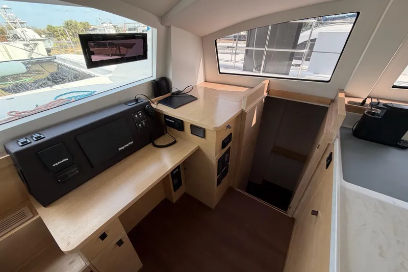 Slide: The Image of Modern interior of 2025 C-Catamarans 48 with navigation equipment and sleek design. - 25