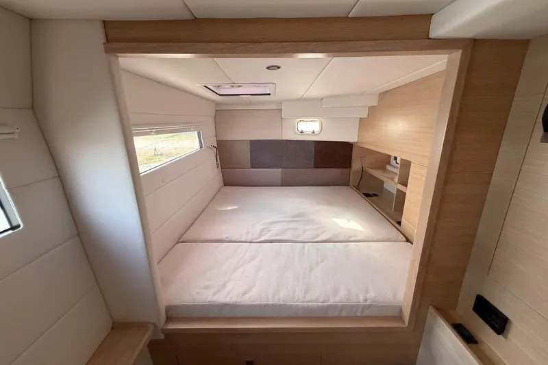 Slide: The Image of Luxurious bedroom interior of 2025 C-Catamarans 48, featuring modern design and ample natural light. - 29