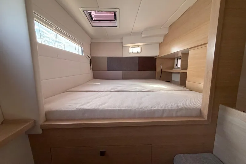 Slide: The Image of Luxurious cabin interior of 2025 C-Catamarans 48 with modern design and comfortable bedding. - 30