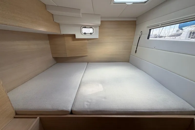 Slide: The Image of Modern interior cabin of 2025 C-Catamarans 48 with cozy bed and natural light. - 41