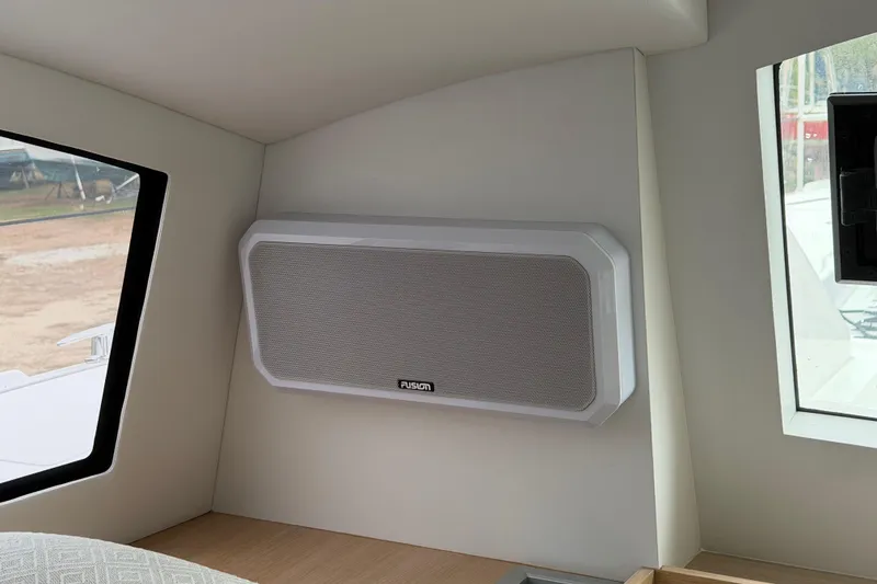 Slide: The Image of Interior of 2025 C-Catamarans 48 featuring a Fusion speaker on the wall. - 47
