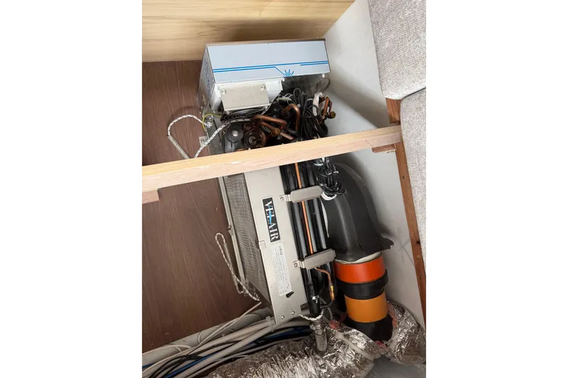 Slide: The Image of Electrical components inside a 2025 C-Catamarans 48, showcasing wiring and equipment. - 57