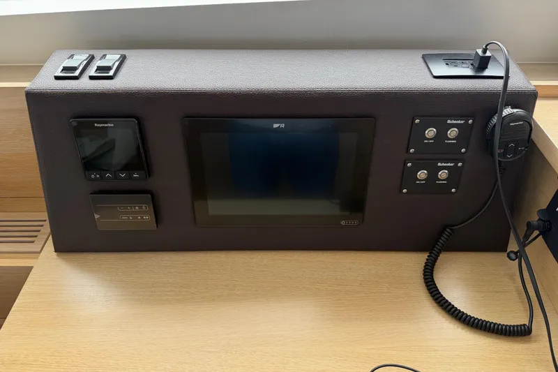 Slide: The Image of Control panel of 2025 C-Catamarans 48 with navigation and communication systems. - 63