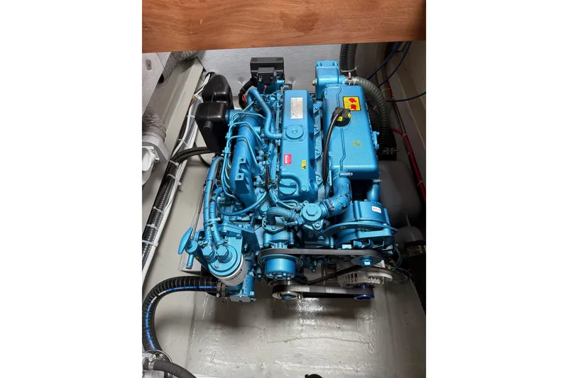 Slide: The Image of Engine of 2025 C-Catamarans 48, showcasing intricate mechanical components. - 75