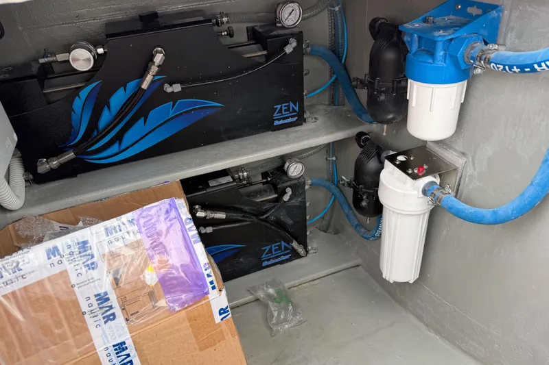 Slide: The Image of Engine room of 2025 C-Catamarans 48 with filtration system and equipment. - 77