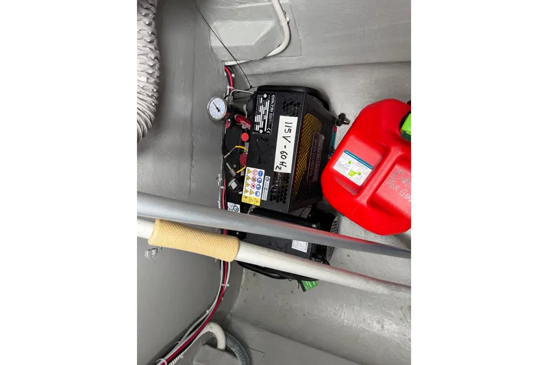 Slide: The Image of Battery and fuel container in 2025 C-Catamarans 48 engine compartment. - 79