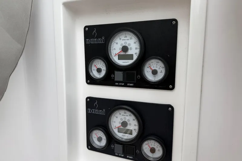 Slide: The Image of Instrument panel of 2025 C-Catamarans 48, featuring gauges and controls. - 80