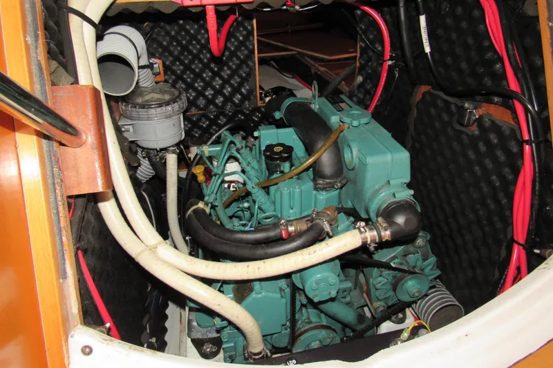 Slide: The Image of Engine compartment of a 2002 Beneteau First 40.7 sailboat, showcasing detailed components. - 15