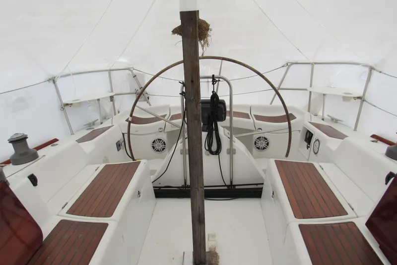 Slide: The Image of Beneteau First 40.7 sailboat cockpit with wooden seating, 2002 model. - 16