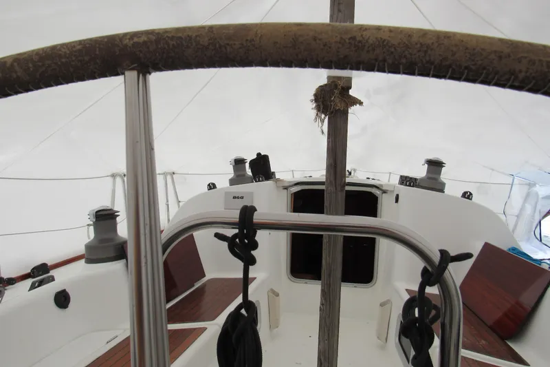 Slide: The Image of Interior view of a 2002 Beneteau First 40.7 sailboat cockpit under cover. - 20