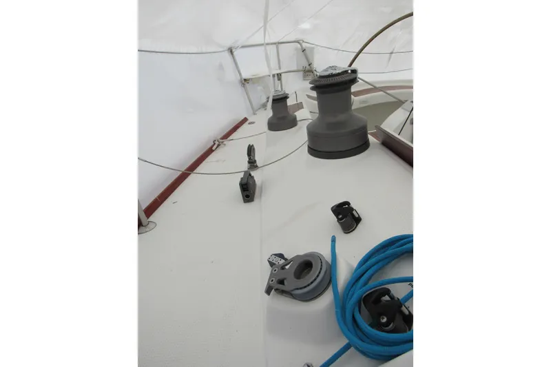 Slide: The Image of Deck of 2002 Beneteau First 40.7 sailboat with winches and blue rope. - 28