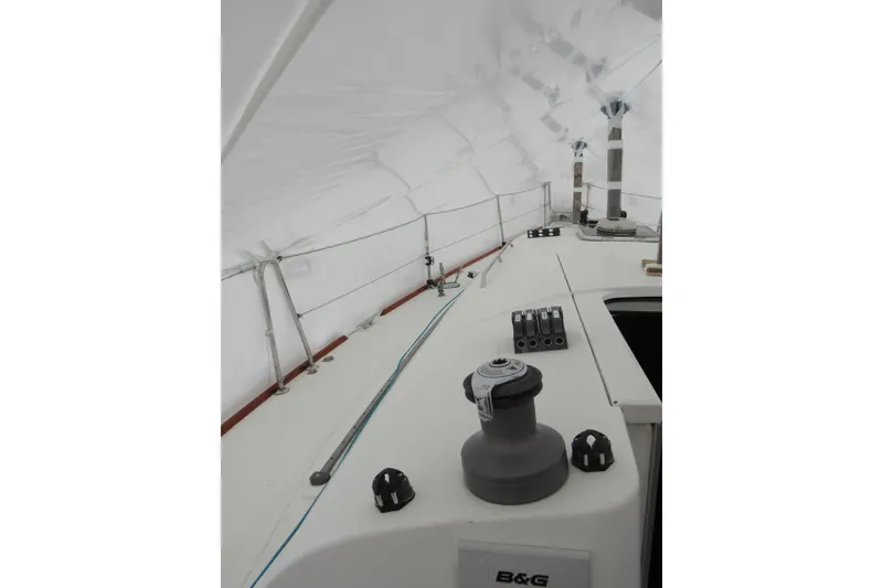 Slide: The Image of Beneteau First 40.7 yacht deck, 2002 model, under protective cover. - 31