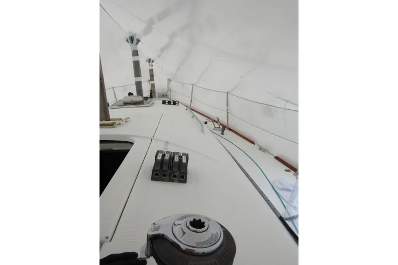 Slide: The Image of Beneteau First 40.7 sailboat deck, 2002 model, under protective cover. - 32