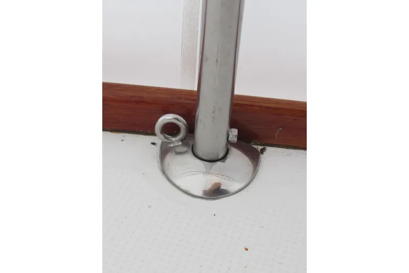 Slide: The Image of Close-up of a metal fitting on a 2002 Beneteau First 40.7 sailboat. - 35