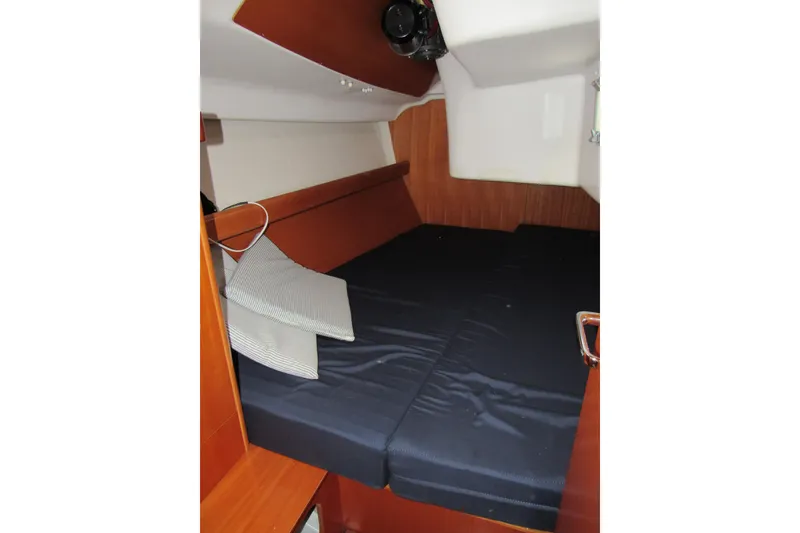 Slide: The Image of Interior cabin of 2002 Beneteau First 40.7 sailboat with cozy bedding. - 8