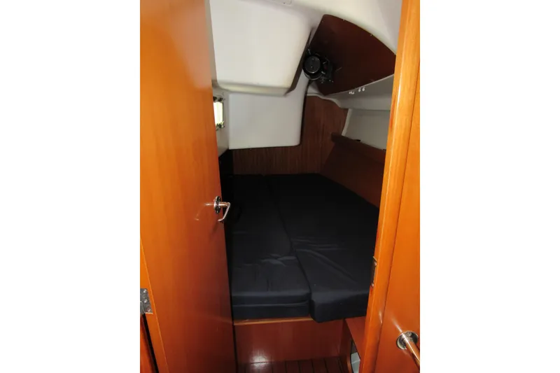 Slide: The Image of Cozy cabin interior of 2002 Beneteau First 40.7 sailboat with wooden finish. - 9