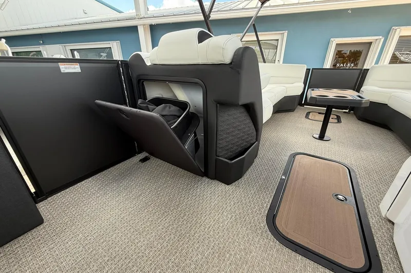 Slide: The Image of Luxurious interior of 2026 Evotti 725CS boat with seating and storage compartments. - 10