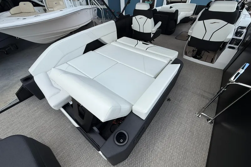 Slide: The Image of 2026 Evotti 725CS boat interior with convertible seating and modern design. - 16