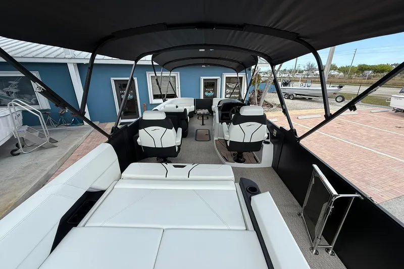 Slide: The Image of Luxurious interior of 2026 Evotti 725CS boat with sleek seating and canopy. - 18