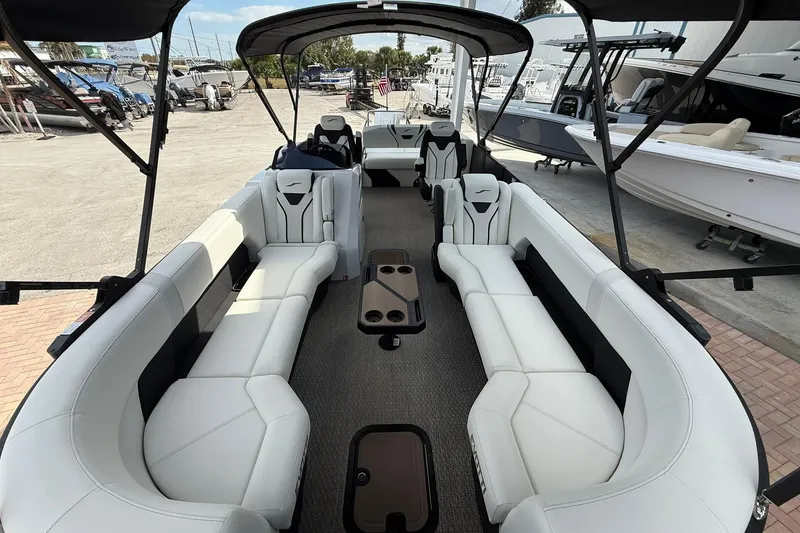 Slide: The Image of Luxurious 2026 Evotti 725CS boat interior with spacious white seating and modern design. - 4