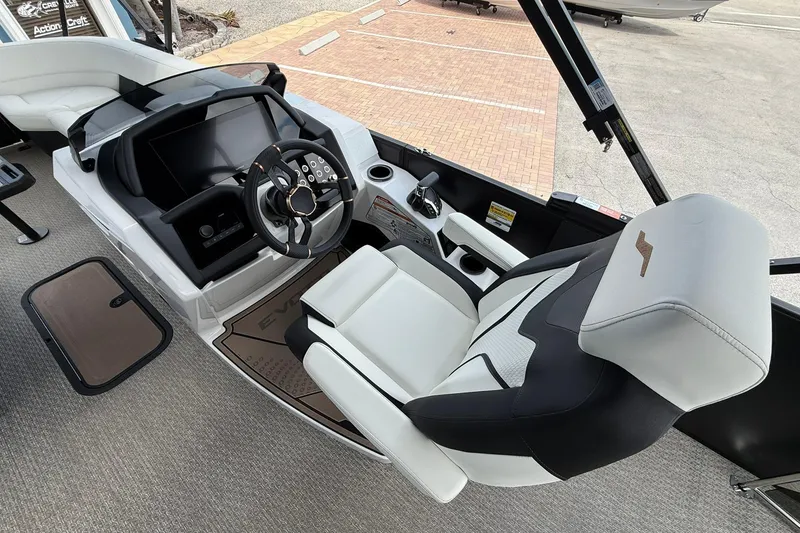 Slide: The Image of 2026 Evotti 725CS boat interior with modern steering and luxurious seating. - 8