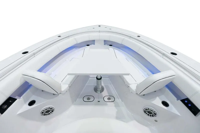 Slide: The Image of Manufacturer Provided Image: 2025 Sportsman Open 352 Center Console boat interior with seating and table. - 6