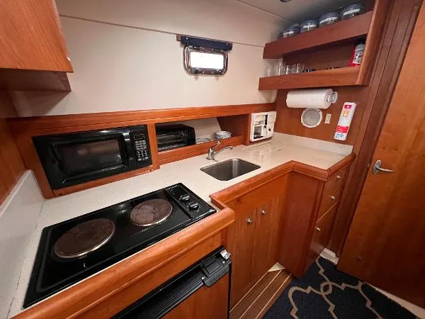 Slide: The Image of Mainship 34 Pilot Rumrunner 2004 - 11