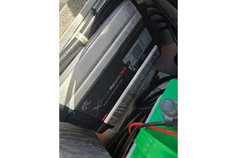Slide: The Image of Battery charger in a 2020 G3 Sportsman 1810 boat, featuring ProSeries 15.3 model. - 10