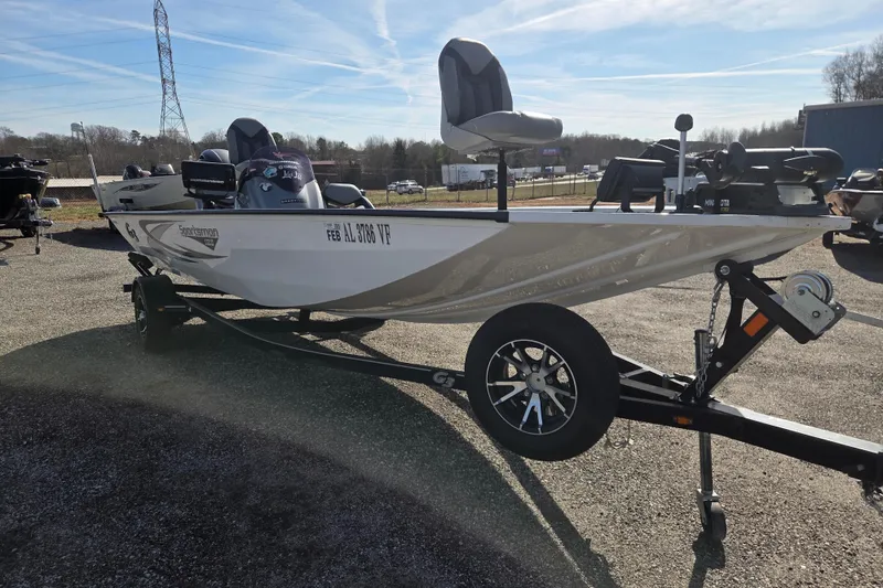 Slide: The Image of 2020 G3 Sportsman 1810 boat on trailer, parked outdoors under clear sky. - 2