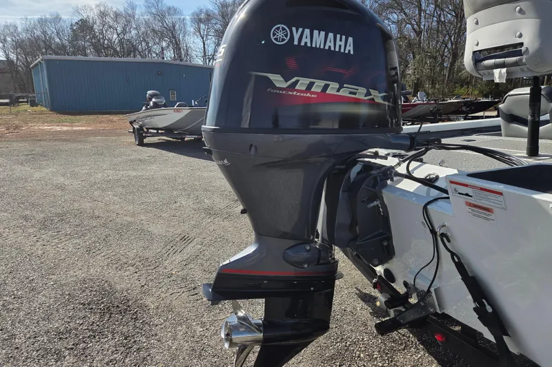 Slide: The Image of 2020 G3 Sportsman 1810 with Yamaha VMAX outboard motor in a parking lot. - 4
